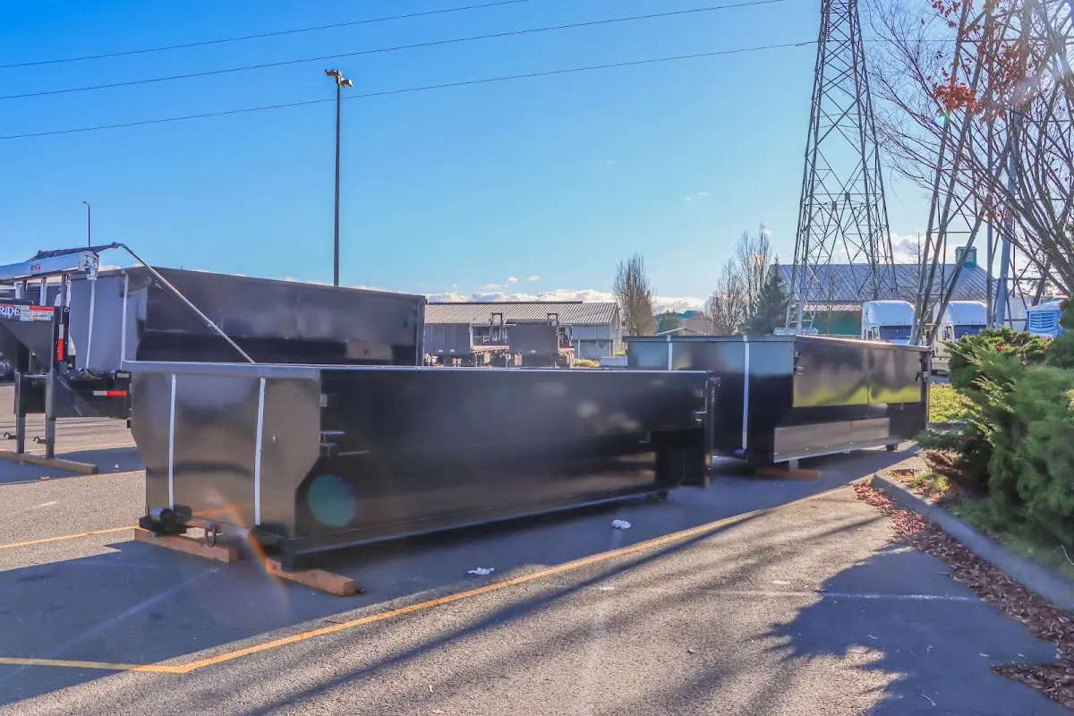 Roll-off dumpster ready for waste disposal at job site for Concrete Dumpster Rental in Mayville